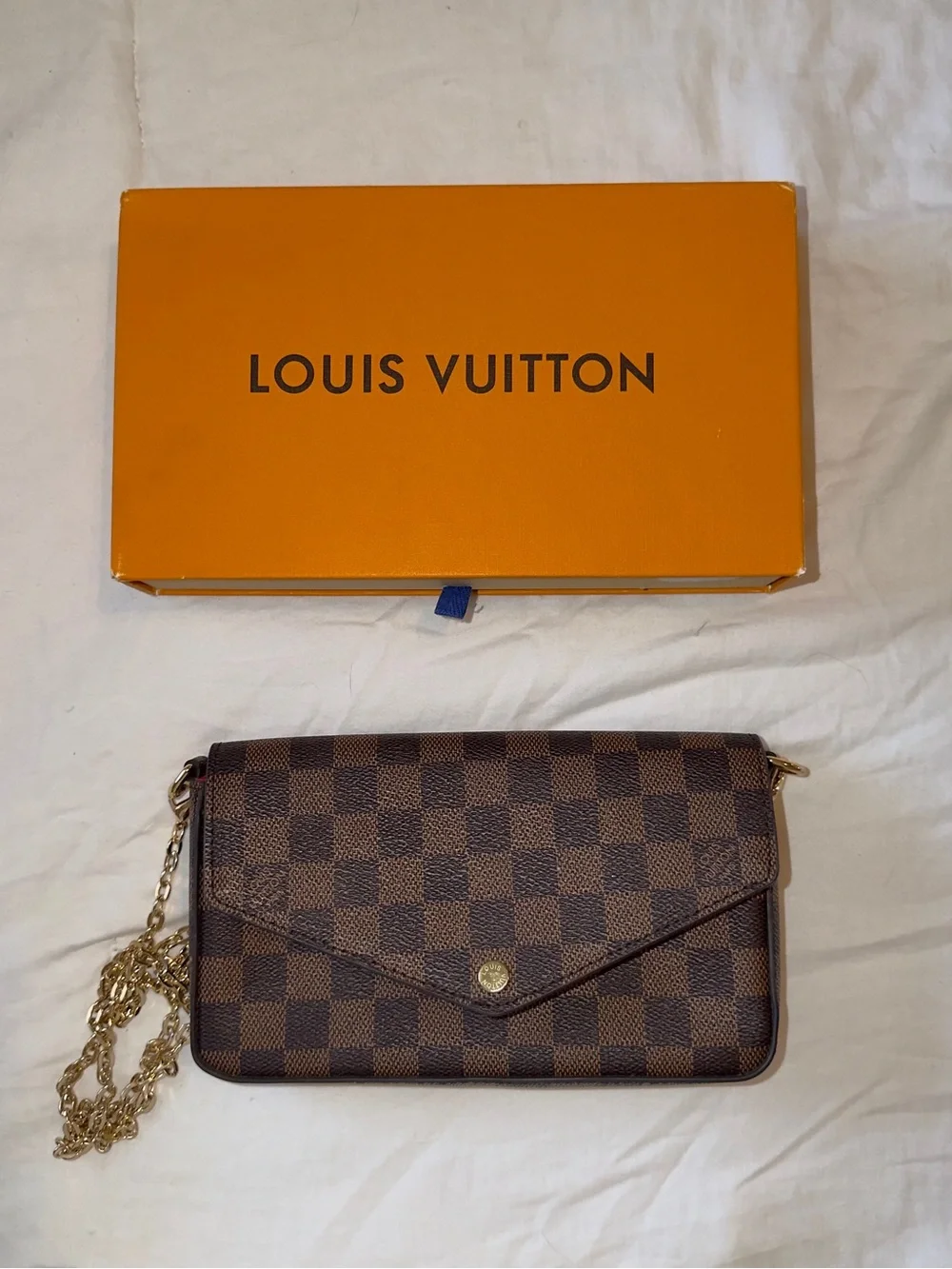 Brown and black checkered wristlet /crossbody